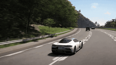 White Sports Car Driving Down Highway GIF