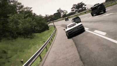 White Sports Car Driving Down Highway GIF