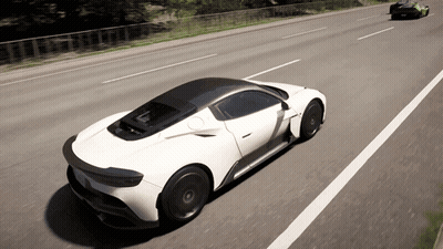 White Sports Car Driving Down Highway GIF
