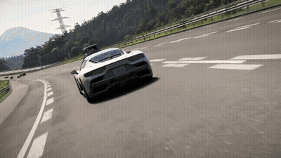 White Sports Car Driving Past Mountains GIF