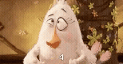 White Stuffed Orange-Beaked Animal By Flower Wall GIF