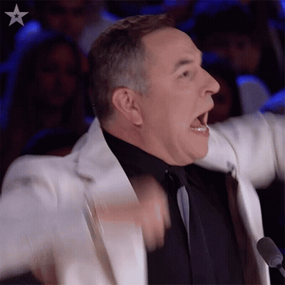 White Suit Man Open Mouth At Microphone GIF