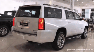 White SUV With Suburban On Back GIF