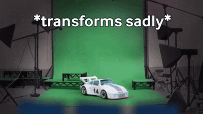 White Toy Car With Number 14 GIF