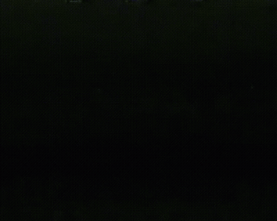 White Triangle On Yellow Background GIF