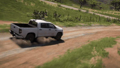 White Truck Driving Down Dirt Road GIF