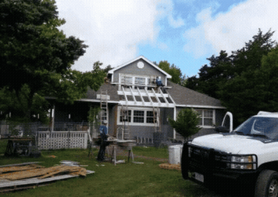 White Truck Parked In Front Of Remodeled House GIF
