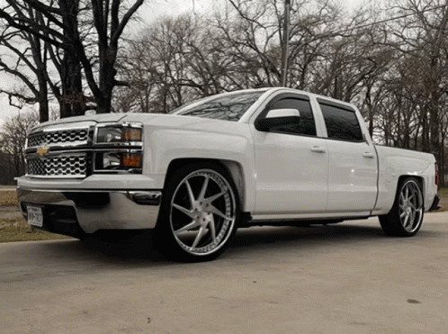 White Truck With Texas License Plate Parked GIF