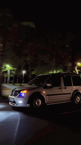 White Van Driving At Night With AA License Plate GIF