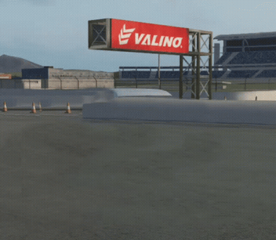 White Van Driving Past Valino Billboard GIF