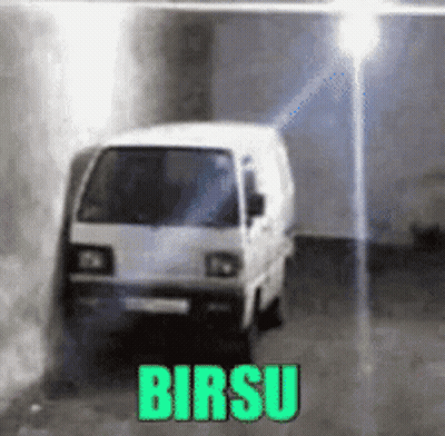 White Van Parked In Dark Room With Birsu GIF