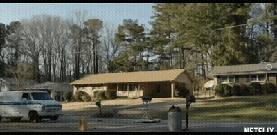 White Van Parked In Front Of House With Netflix GIF