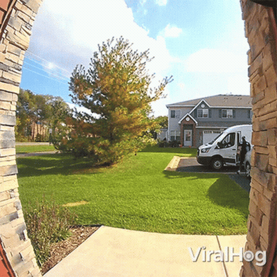 White Van Parked In Front Of House With Viralhog GIF