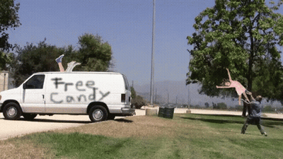 White Van With Free Candy Written On It GIF