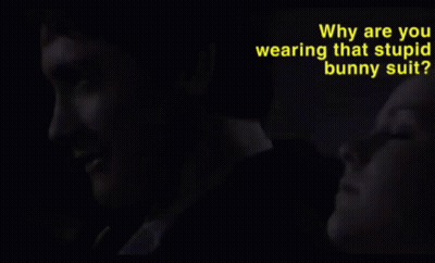 Why Are You Wearing That Stupid Man Suit Is Written In Yellow GIF
