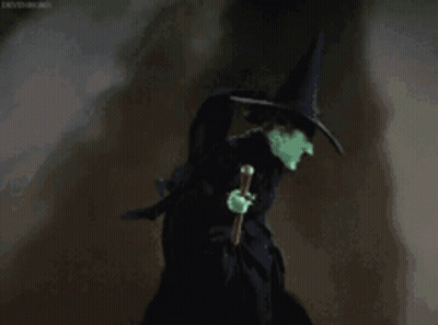 Wicked Witch From The Wizard Of Oz Holding Cane GIF