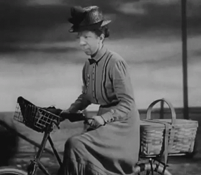 Wicked Witch Melting Almira Gulch Riding Bicycle GIF