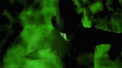 Wicked Witch Of The West In Black Hat And Jacket GIF