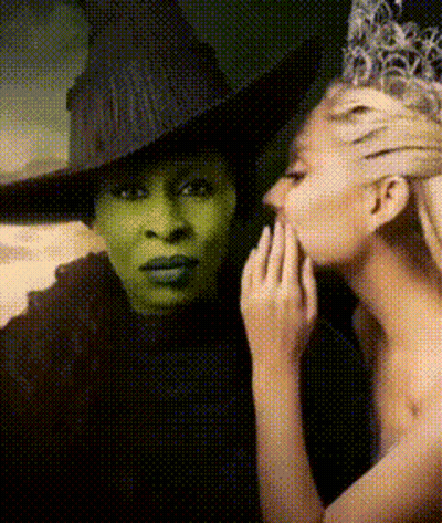Wicked Witch Of The West Whispering In Woman's Ear GIF