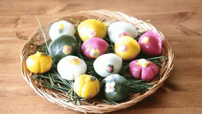 Wicker Basket Filled With Colored Balls GIF