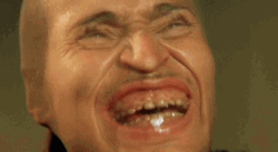 Willem Dafoe Weird Face In Foot Socks Laughing GIF