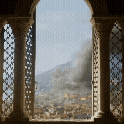 Window View of City With Smoke From Mountains