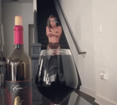 Wine Bottle And Glass With Woman GIF
