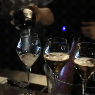 Wine Bottle Pouring Into IWill Glass GIF