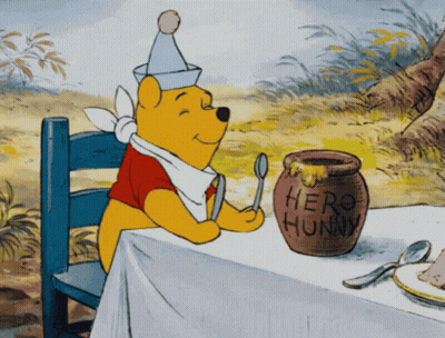 Winnie The Pooh At Table With Honey And Spoon GIF