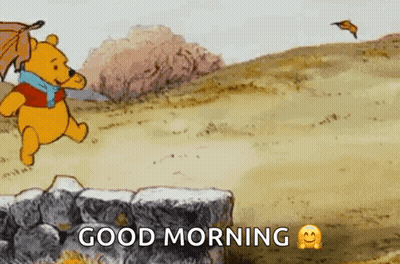 Winnie The Pooh Is Running In A Field With An Umbrella And Leaves Flying In The Wind . GIF