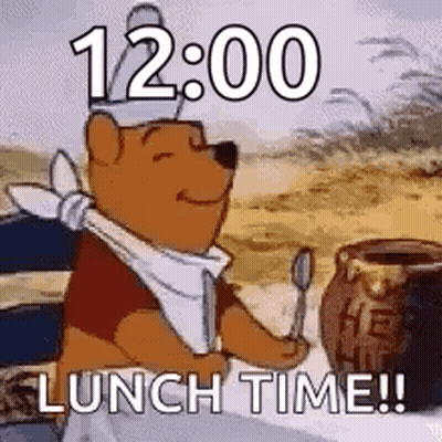 Winnie The Pooh Is Sitting At A Table With A Spoon In His Hand And A Jar Of Honey . GIF