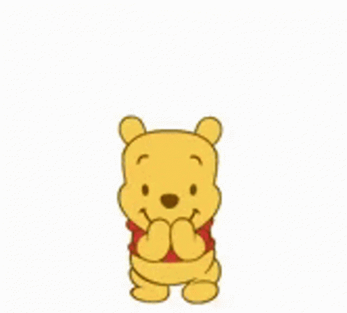 Winnie The Pooh Is Wearing A Red Shirt And Holding A Pink Heart Over His Head . GIF