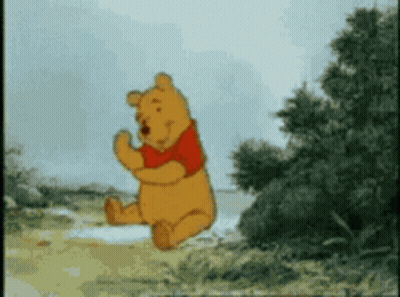 Winnie The Pooh Jumping In Air With Trees GIF