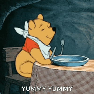Winnie The Pooh Sitting At Table GIF