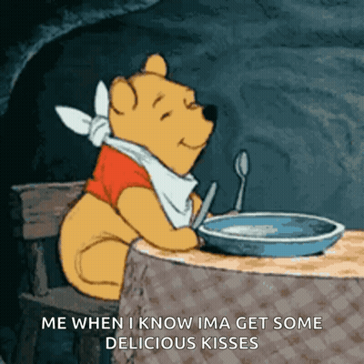 Winnie The Pooh Sitting At Table With Bowl Of Cereal And Spoon GIF
