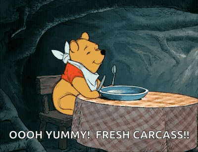 Winnie The Pooh Sitting At Table With Bowl Of Soup GIF