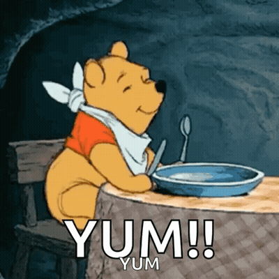 Winnie The Pooh Sitting At Table With Food GIF