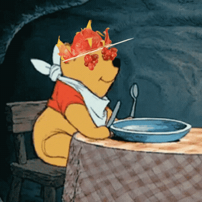 Winnie The Pooh Sitting At Table With Food GIF