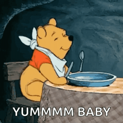 Winnie The Pooh Sitting At Table With Food GIF