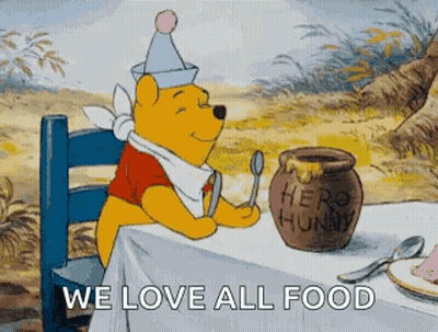Winnie The Pooh Sitting At Table With Honey Jar And Spoon GIF