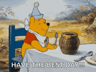 Winnie The Pooh Sitting At Table With Honey Pot And Spoon GIF