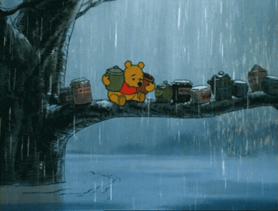 Winnie The Pooh Sitting On Tree Branch In Rain GIF