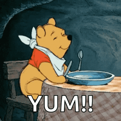 Winnie The Pooh Sitting With Food And Yum GIF