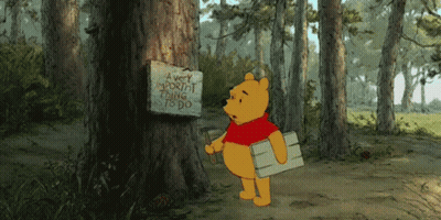 Winnie The Pooh Standing Next To Tree Sign Saying A Very Important Thing To Do GIF