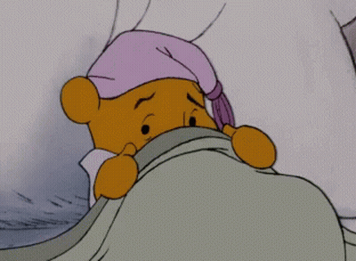 Winnie The Pooh Wearing Night Cap GIF