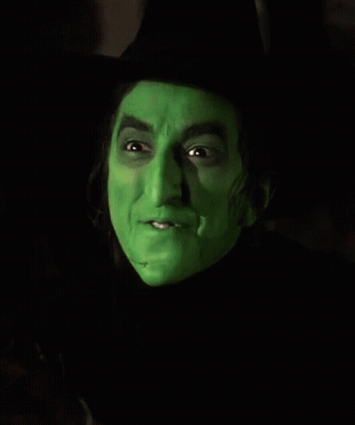 Witch Face With Green Paint GIF