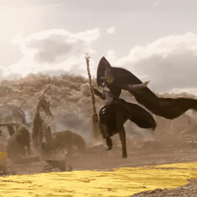 Witch Flying Over Yellow Road GIF