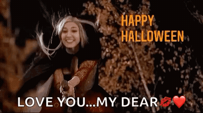 Witch In Costume Holding Pumpkin Says Happy Halloween Love You My Dear GIF