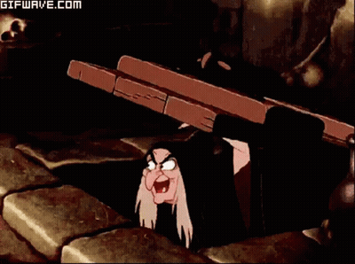Witch Peeking From Under Table GIF
