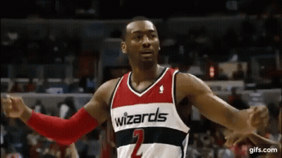 Wizards Basketball Player Arms Outstretched Before Crowd GIF
